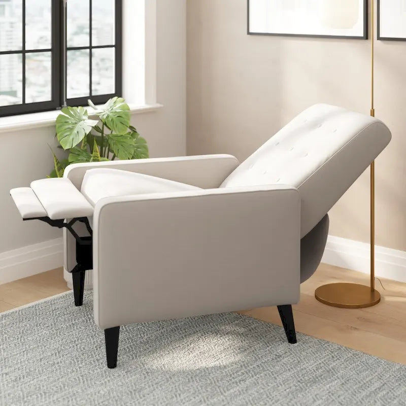 Fauteuil inclinable à dossier capitonné avec mécanisme de poussée